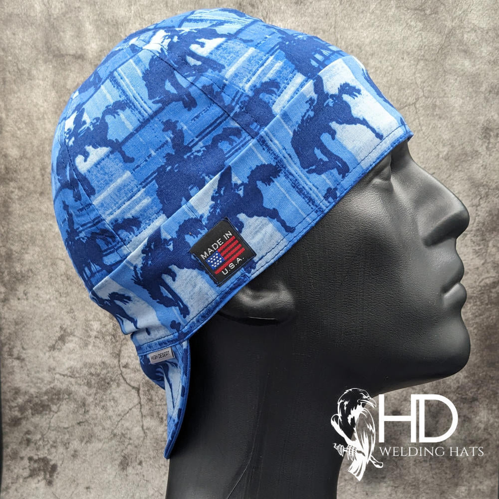 Side view of the Bronc Rider Welding Cap featuring blue bronc silhouettes on a denim-style background — handcrafted by HD Welding Hats.