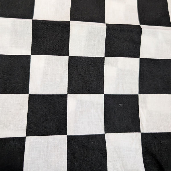 Close-up of black-and-white checkered cotton fabric used for the HD Welding Hats Checkered Flag Welding Hat.