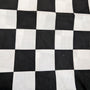 Close-up of black-and-white checkered cotton fabric used for the HD Welding Hats Checkered Flag Welding Hat.