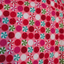 Pink cotton fabric with red, green, aqua, and white peppermint candy print used for the HD Welding Hats Christmas Candy Welding Hat.