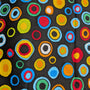 Black cotton fabric with multicolored concentric circle pattern used for the HD Welding Hats Circles Welding Hat.