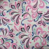 Frontier Paisley Spring Welding Cap fabric featuring pink, blue, and teal paisley swirls on a cream background, handcrafted by HD Welding Hats.