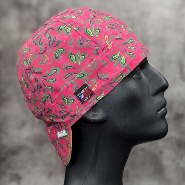 Frontier Paisley Fuchsia Welding Cap – pink fuchsia cotton welding hat with green and gold paisley print and FR denim brim, handmade in the USA by HD Welding Hats.