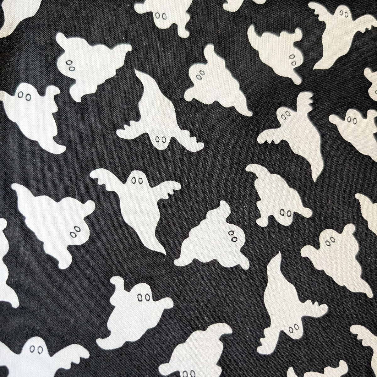 Ghosts Welding Cap fabric featuring white cartoon-style ghosts on a black background, handcrafted by HD Welding Hats with FR denim brim.