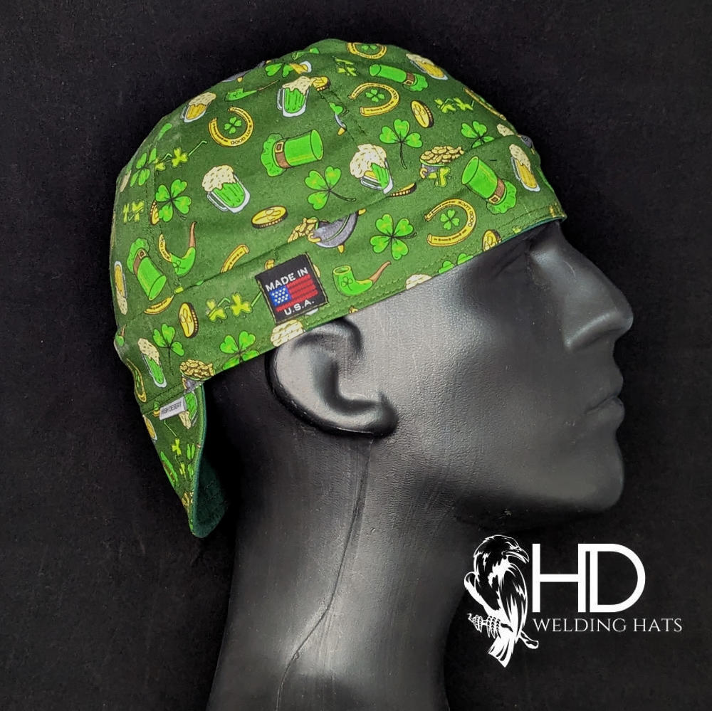Good Luck Welding Cap with green shamrock, horseshoe, and leprechaun hat print, handmade by HD Welding Hats with a fire-resistant denim brim.