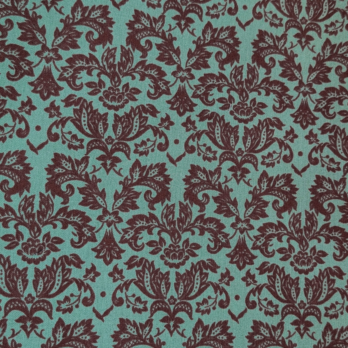 Green Damask Welding Hat fabric featuring maroon damask floral pattern on green cotton, handcrafted by HD Welding Hats with FR denim brim, Made in USA.