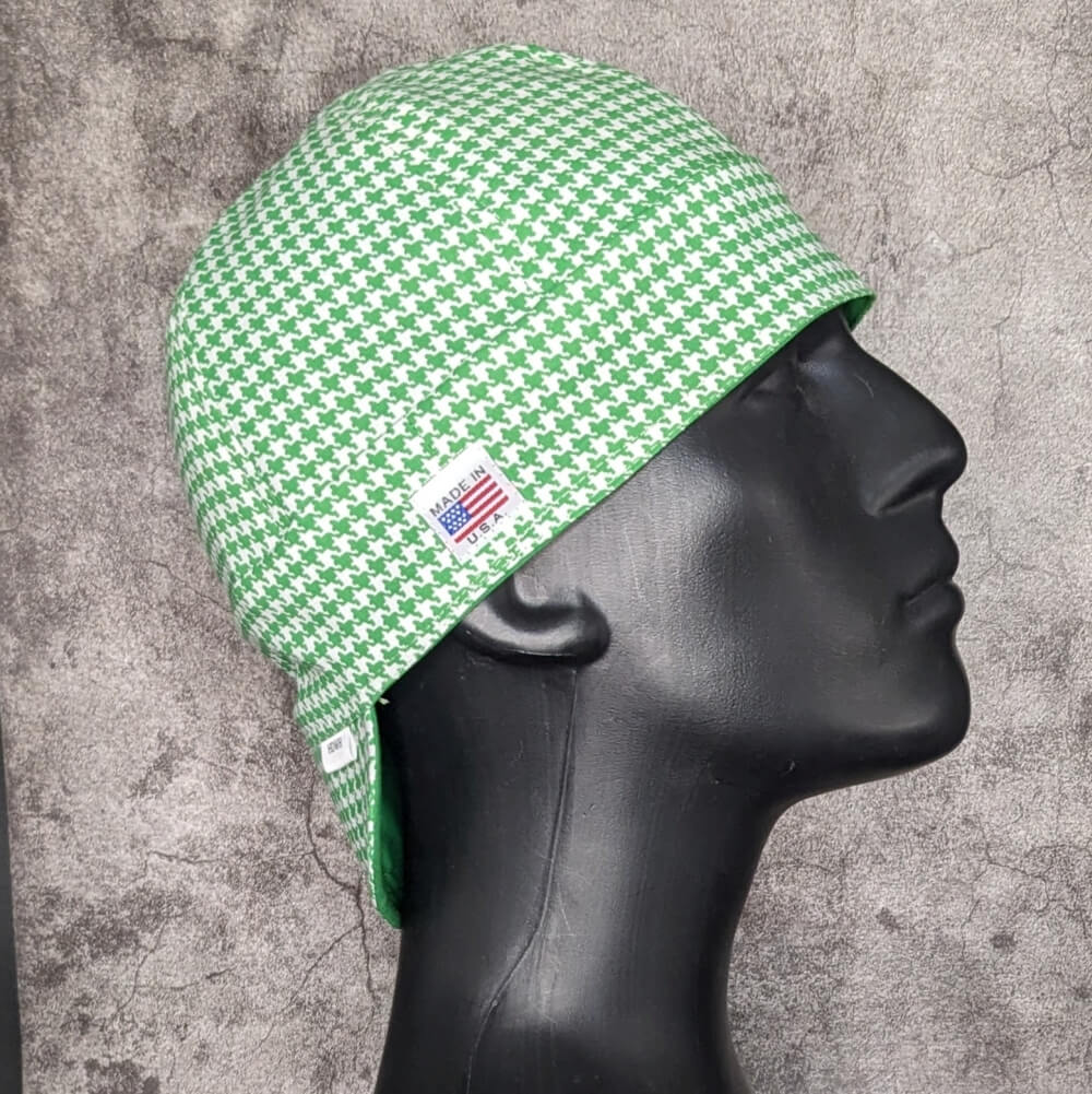 Green and white houndstooth welding cap handcrafted by HD Welding Hats with FR denim brim, cotton lining, and Made in USA label.