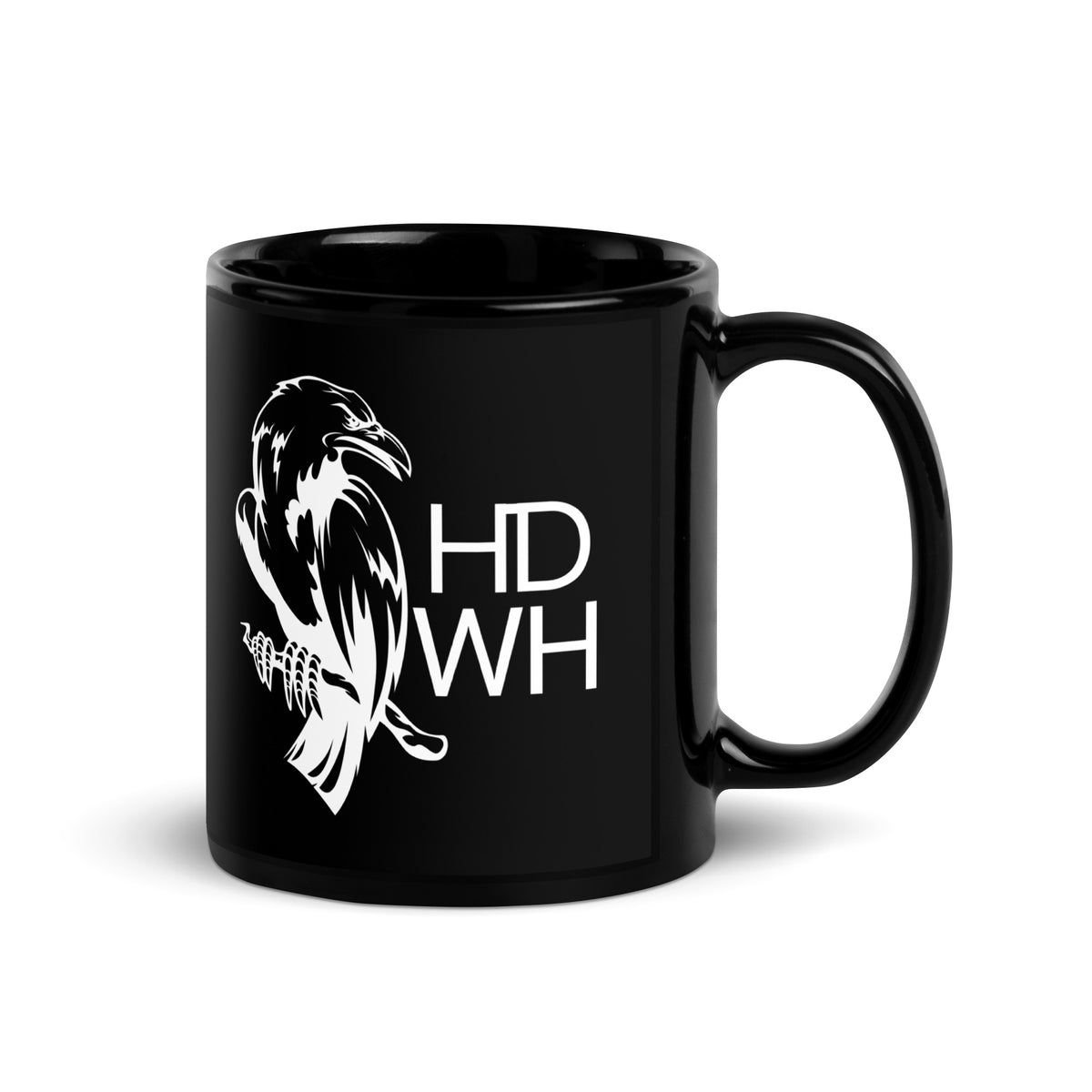 Black glossy ceramic mug featuring white HD Welding Hats logo with crow design, available in 11 oz and 15 oz sizes.