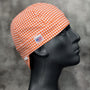 Orange Houndstooth Welding Cap with bold orange-and-white check pattern, handmade in the USA by HD Welding Hats with FR denim brim.