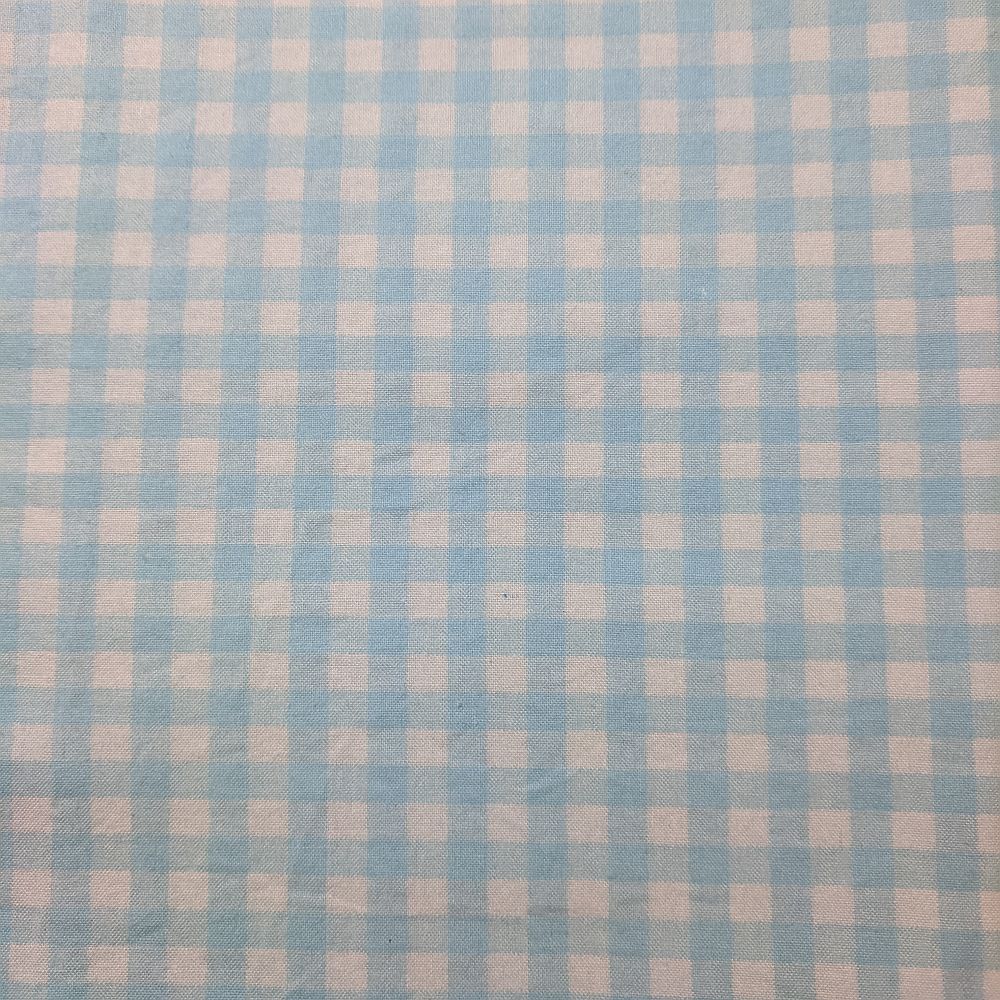 Close-up of the Blue Checks Welding Cap fabric featuring a light blue and white check pattern — handcrafted by HD Welding Hats.