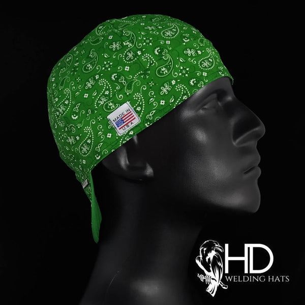 Green paisley bandanna welding cap handcrafted by HD Welding Hats, featuring FR denim brim, cotton lining, and Made in USA label.