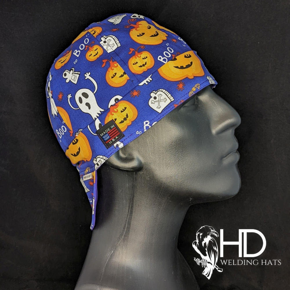 Side view of the Boo 2 You Welding Hat with a blue background and Halloween print featuring pumpkins and ghosts — handcrafted by HD Welding Hats.