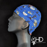 Side view of the Army 5 Star Welding Cap in blue cotton with U.S. Army emblems, helicopters, and stars, featuring “Made in USA” label — handcrafted by HD Welding Hats.