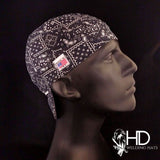 Side view of the Black Bandanna Welding Cap featuring a white paisley print on black cotton fabric — handcrafted by HD Welding Hats.