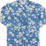 Blue shirt with white floral pattern on a white background