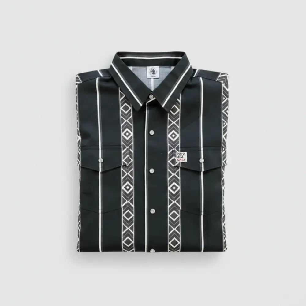 A folded black long-sleeve button-up shirt with white vertical stripes and geometric diamond patterns, displayed on a light gray background.