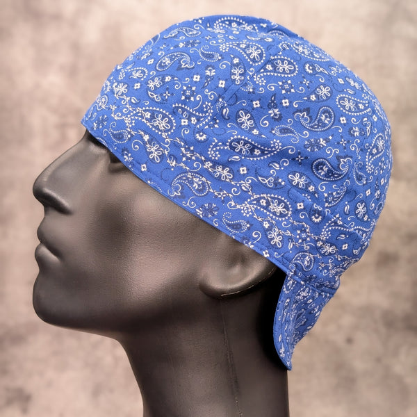 Left facing view of the Blue Bandanna cotton welding cap