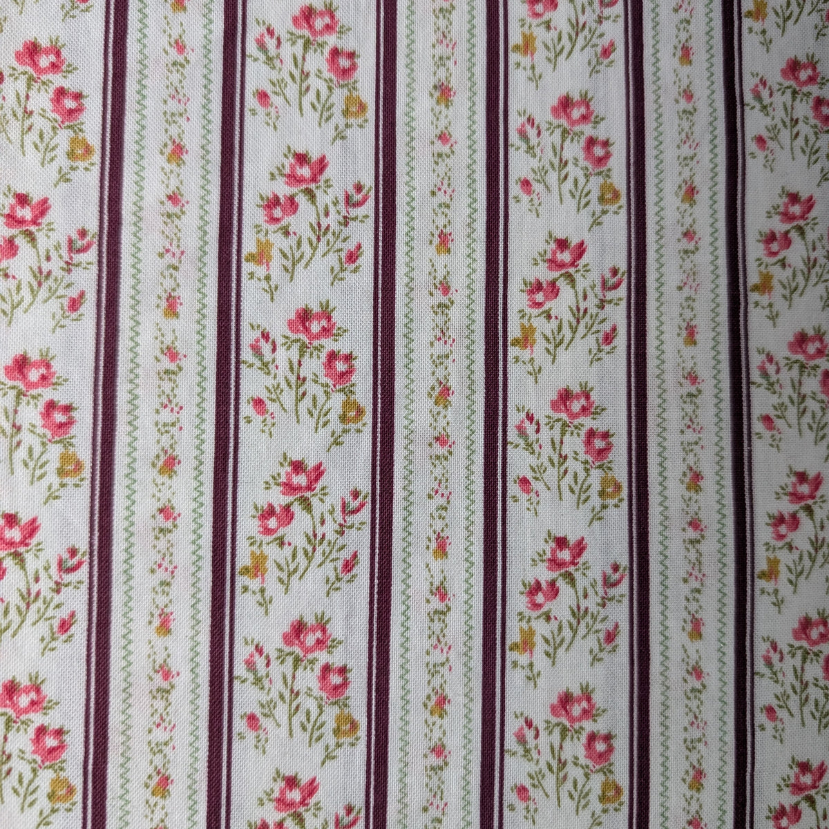 Ticking w/ Burgundy Stripe Welding Cap fabric – cream base with burgundy and green stripes and pink floral details, handcrafted cotton welding hat by HD Welding Hats.