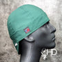 Hunter Green Welding Cap with solid cotton fabric, FR denim brim, and Made in USA label by HD Welding Hats.