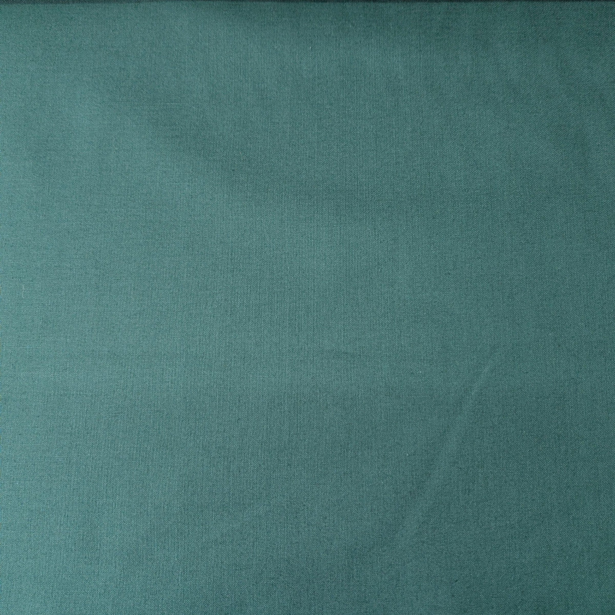 Teal Cotton Welding Cap fabric close-up showing solid teal cotton fabric.