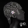 Side view of the Black Paisley Bandanna Welding Cap featuring a white paisley pattern on black cotton fabric — handcrafted by HD Welding Hats.