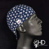 Side view of the Andover Welding Cap in navy cotton fabric with small patterned print and “Made in USA” label — handcrafted by HD Welding Hats.