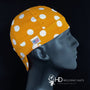 Orange Dots Welding Cap featuring white polka dot print on orange cotton, handmade in the USA by HD Welding Hats with FR denim brim.